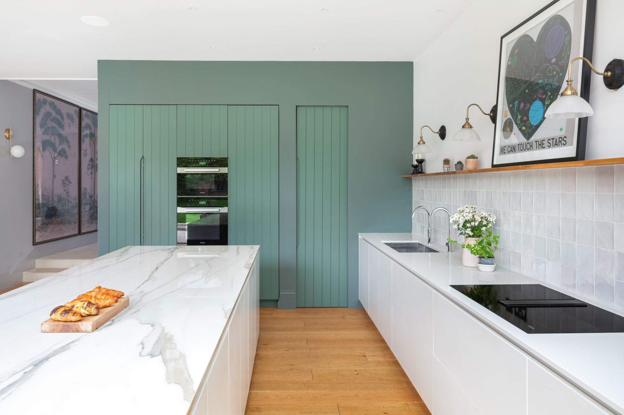 Modern Kitchen with mint green pantry